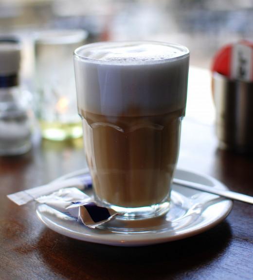 A cafe au lait consists of half brewed coffee, and half warmed milk.  It looks like a cappuccino, but it's not!