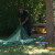 Bert setting up his tent in the yard.