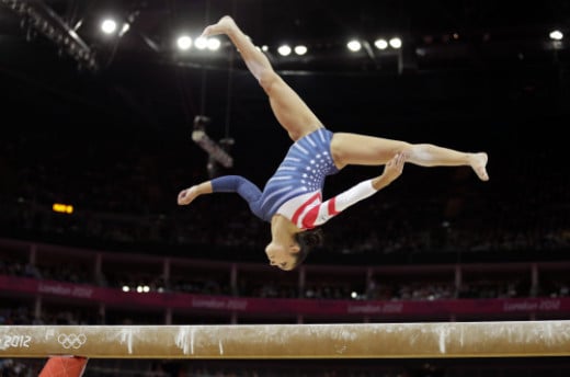 Alexandra Raisman inverted while performing on the balance beam in the 2012 Summer Olympics in London.