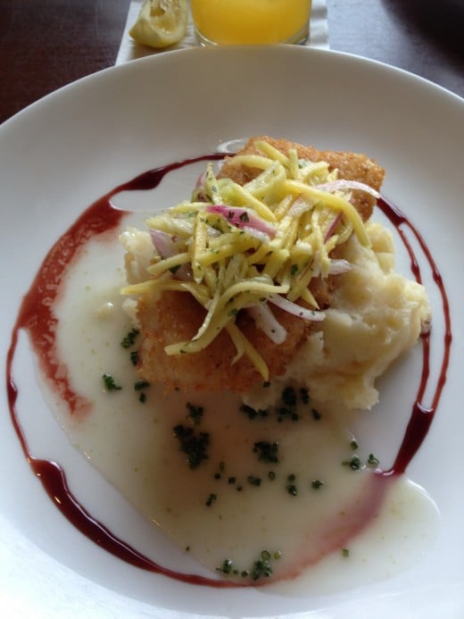 Fresh pecan-crusted cod, citrus mashed potatoes, and mango slaw served over a delicious coconut lime sauce!