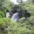 A tourist using water ways to climb down. Amazing waterflow in Sundarijal Nepal. A tourist using water ways to climb down. Amazing waterflow in Sundarijal Nepal.