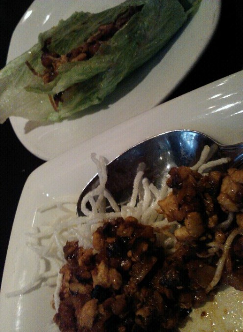 Lettuce wraps are the delightful start to the dinner!  Filled with chicken, chestnuts, onions and mushrooms, crisp lettuce cups set the stage to a great meal!