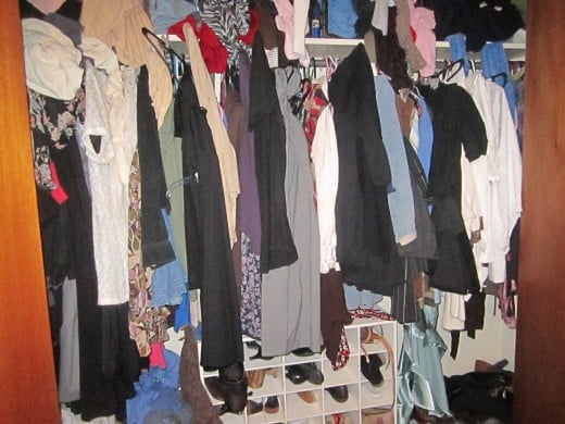 7 Ways To Save Money On Clothing Tou!   ghnickel - a closet packed full of clothes many of which are not worn who needs