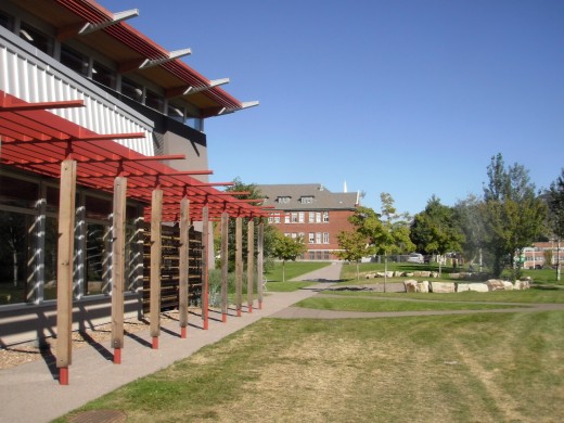 The verandah shades the south windows of the Sk'elup School of Excellence library, facing east toward the old St Joseph Indian Residential School.