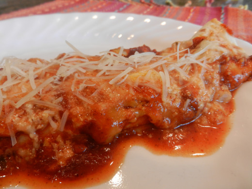 A cheese enchilada ready to be enjoyed. 
