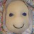 Begin forming facial features by hand sewing with heavy thread on a large needle. Attach bonnet and/or hair at this point. Begin forming facial features by hand sewing with heavy thread on a large needle. Attach bonnet and/or hair at this point.