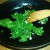 Sauteed spinach and garlic make the bottom layer of the quiche.
