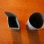 Cut along each corner about 1/4 up the length of the tube to create four flaps. Cut along each corner about 1/4 up the length of the tube to create four flaps.