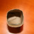 Fold the flaps into the cardboard tube and then push them back down in an overlapping manner. This creates the bottom of the seedling pot. Fold the flaps into the cardboard tube and then push them back down in an overlapping manner. This creates the bottom of the seedling pot.