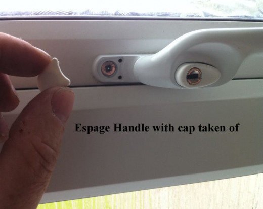 Espage handle with plastic cap taken of