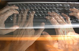 Hands collaborating in co-writing or co-editing or co-teaching in online education by Left rj (Own work) [Public domain], via Wikimedia Commons.