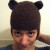 Bear hat with ear flaps.