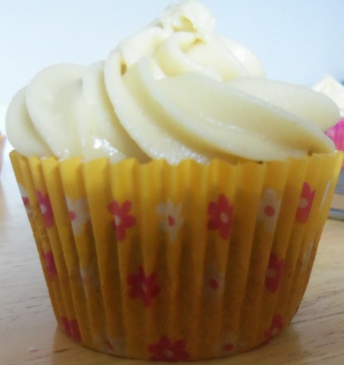 A spiced cupcake with maple frosting
