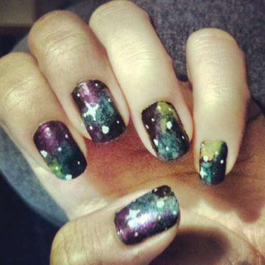 A little messy but it was my first try doing galaxy nails