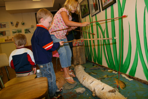 A fishing pole made from string and a stick, with a magnet attached at the end make a great fishing game. Simply attach a paper clip to paper fish, and label the fish with letters to make the game educational.