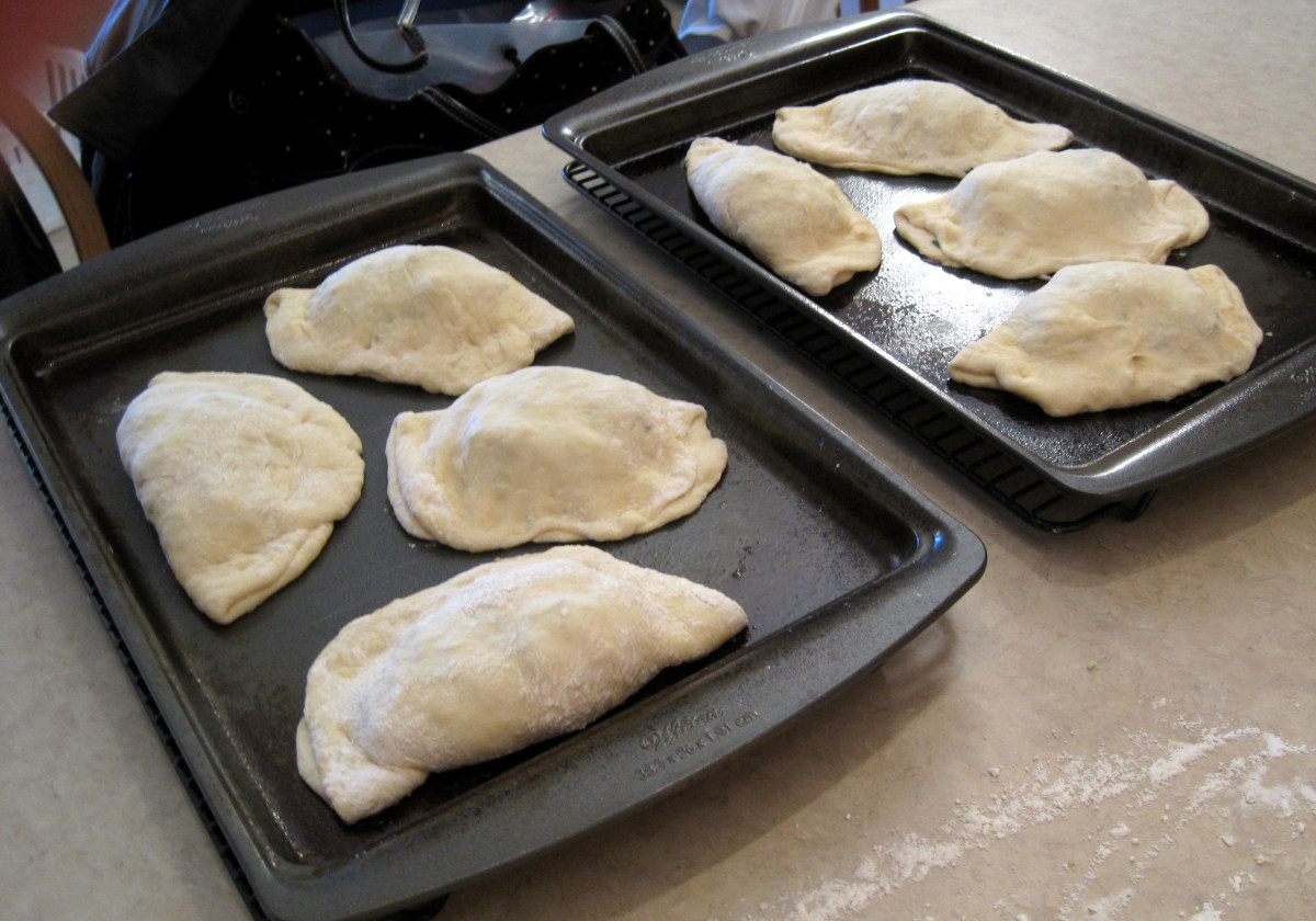 The calzones are ready to go into the oven.