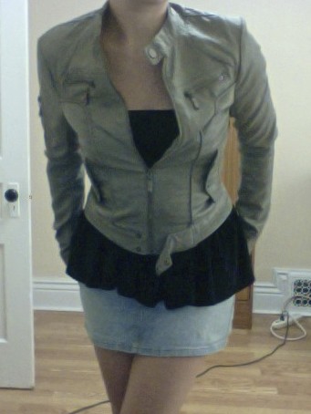 Wearing a flared mini skirt as a peplum tube top.