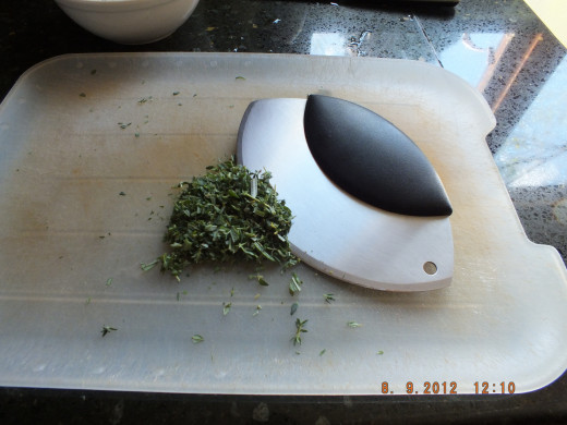 This specialty knife makes short work of the herbs. Its smells divine!