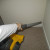 Eureka Bagless Upright Vacuum Cleaner - Vacuuming A Corner. Eureka Bagless Upright Vacuum Cleaner - Vacuuming A Corner.