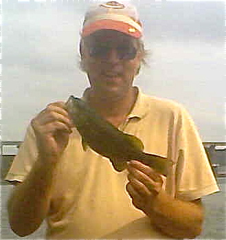 This spunky smallmouth bass jumped about three feet out of the water during its fight!