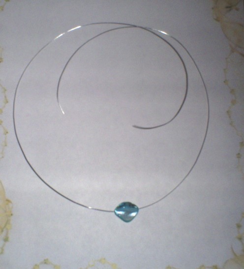A blue shell bead will be used in place of a pendant for this necklace.
