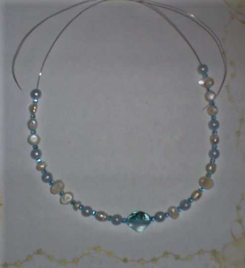 This is what the necklace looks like when half-way completed.