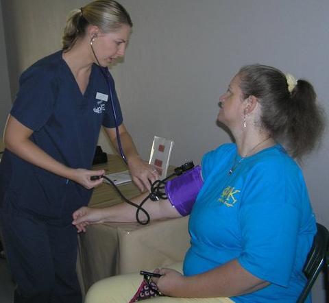 My Dau-in-law checking vital signs for preventative health care.  One can never be too cautious concerning one's health!