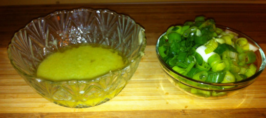 Garlic and butter mixture along with chopped green onions