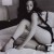 Kristin Kreuk flashing her sexy legs in this black and white picture