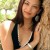 Kristin Kreuk outdoors and smiling