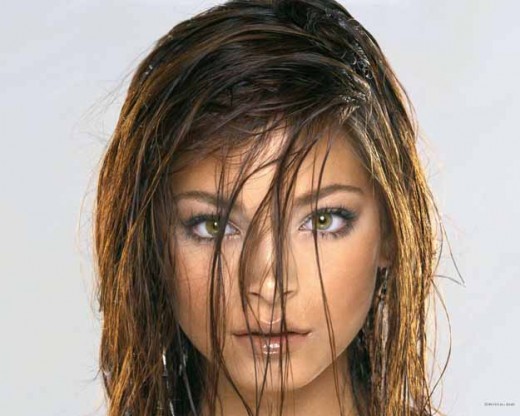 Kristin Kreuk posing with wet hair