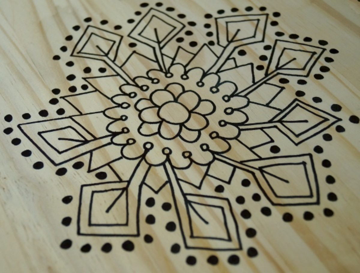 I started with a flower, and then started adding shapes and dots.