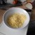 Whilst the muffins are toasting, grate some hard cheese into a bowl