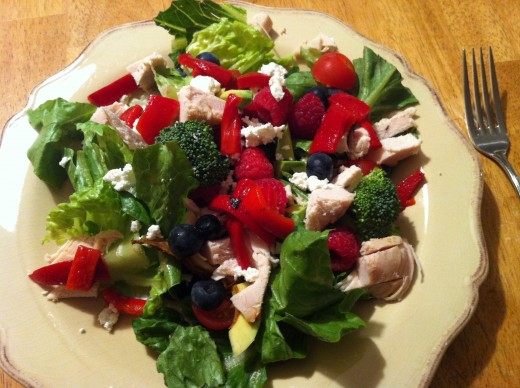 Salads loaded with a variety of fruits and vegetables can be delicious and healthy.