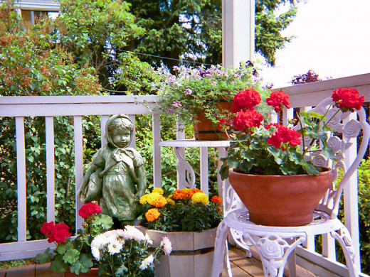 Lovely container groupings on a porch.