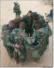 Soldiers In Prayer