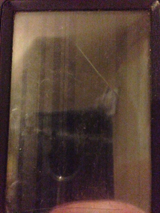 When your force your iPhone too shutdown, you'll notice some thin black vertical bars on your screen. These are normal.