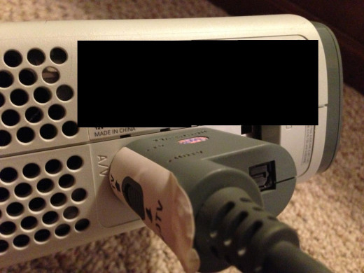 Plug the connector into the A/V input.