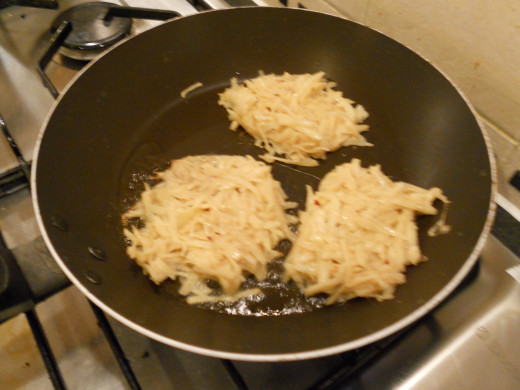 Spoon the ingridients into the frying pan to form patties. They should be around 1cm thick.