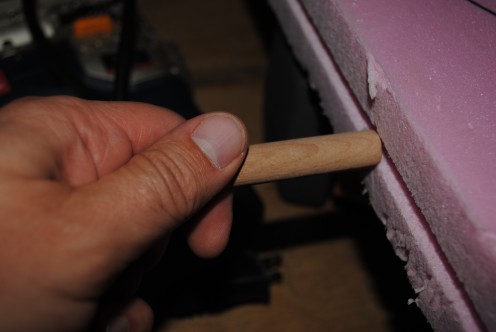 You may find it easier to pre-drill a hole if your dowel is too large