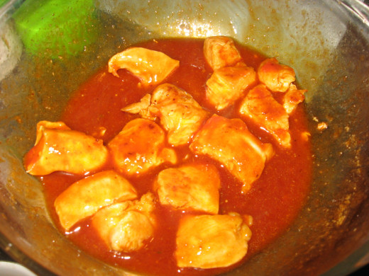 Toss chicken with sauce and bake.