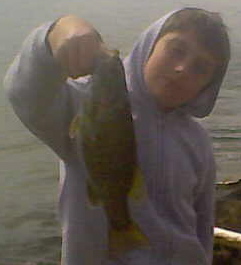 This 12-inch smallmouth bass was caught in faster current in rip-rap on the SR7.