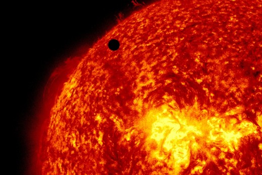 Images from the 2012 transit of Venus event manage to put into perspective the massive size of our own sun in relation to another Earth sized planet.