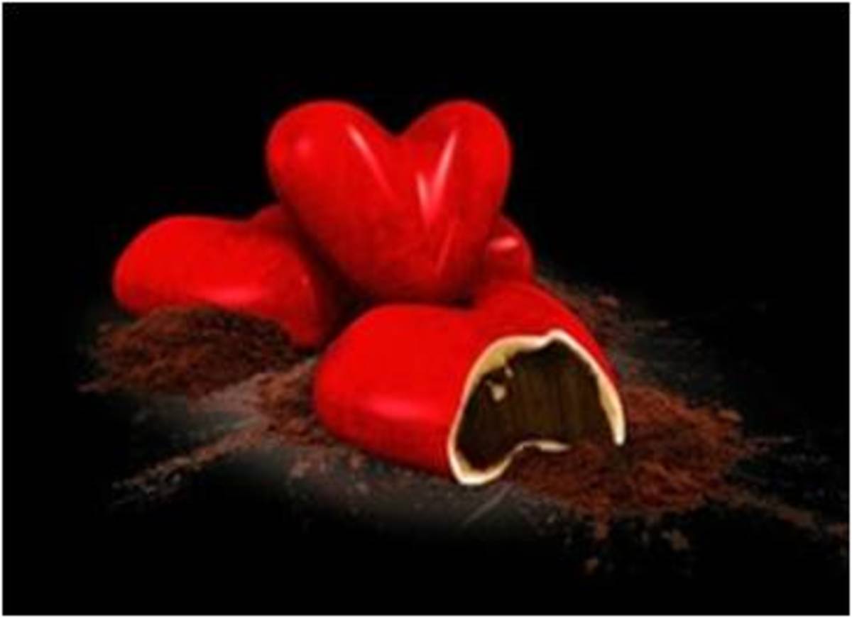 Amore  A divine red heart of dark chocolate ganache infused with bergamot, enclosed in velvety white chocolate.