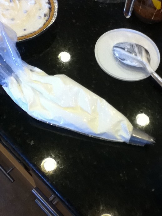 Cool Whip in pastry bag.