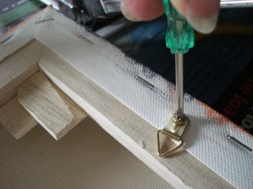 Screwing in the D-ring
