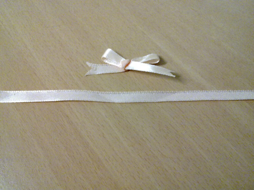 Tie a pretty bow and prepare a string of ribbon