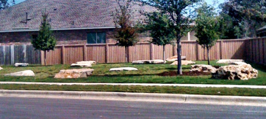 A green space in a newly developing neighborhood. Still under construction, this area was the first to be completed. Entering the neighborhood, it catches the eye.