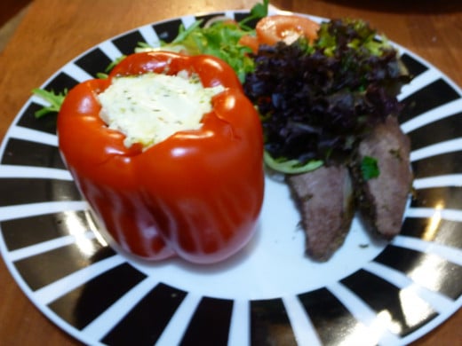 Stuffed Bell Peppers (Capsicums) served with lamb and salad.