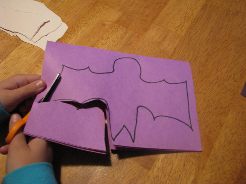 Cutting out the purple bats.